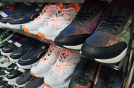 Разнообразный выбор одежды и обуви в магазине «MEGA» - 