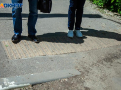 Улицу Московскую выровняют как столичную: рабочие начали укладку свежего асфальта