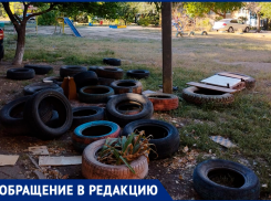 Горы покрышек заполонили двор, волжане требуют действий от УК