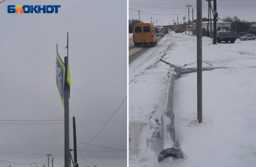 Опора со светофором на пешеходном переходе неделю валяется у дороги в Волжском